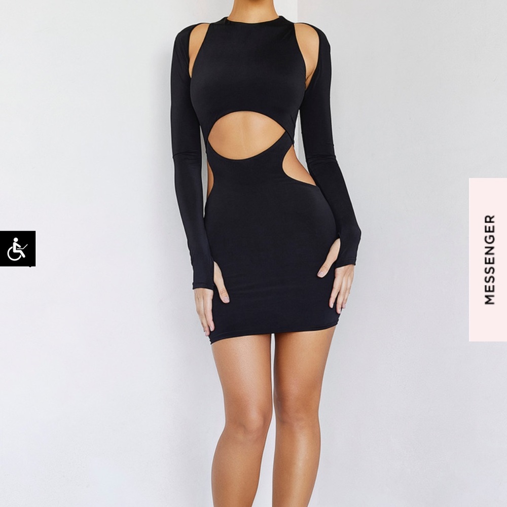 Mistress rocks. Size small never worn. “all yours “black cutout mini dress